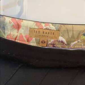 Ted Baker Elegant Black Skirt with Floral Accent